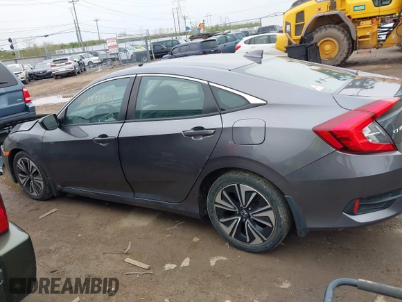 2017 Honda Civic EX-T with VIN 19XFC1F34HE014334, listed as a IAAI auction lot 42009311 with 124,717 mi miles. Bid and sale history available at carsss.com. Image 14.