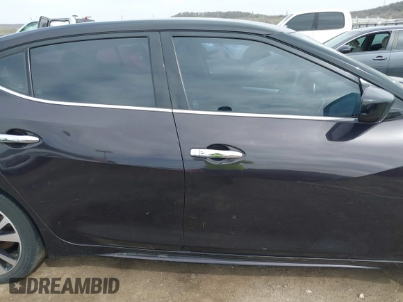2016 Nissan Maxima SL with VIN 1N4AA6AP3GC393930, listed as a IAAI auction lot 41829151 with 202,255 mi miles and . Bid and sale history available at DreamBid. Image 13.