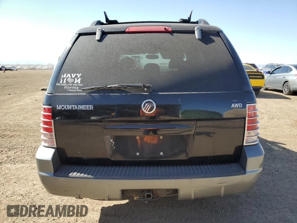 2005 Mercury Mountaineer Convenience with VIN 4M2ZU86KX5ZJ00820, listed as a Copart auction lot 48694705 with 191,101 mi miles and Salvage title. Bid and sale history available at DreamBid. Image 6.
