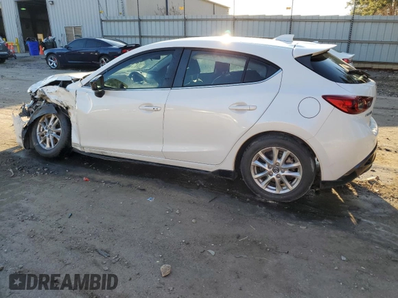 2014 Mazda 3 i Grand Touring with VIN JM1BM1M76E1200859, listed as a Copart auction lot 43520005 with 97,675 mi miles and Salvage Title. Bid and sale history available at DreamBid. Image 2.