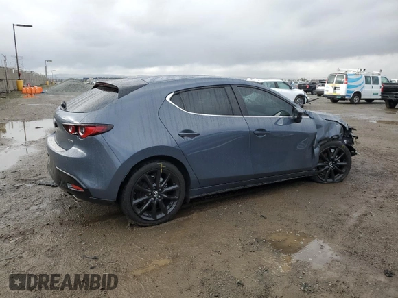 2024 Mazda 3 S Carbon Edition with VIN JM1BPBLM5R1655857, listed as a Copart auction lot 48518815 with 15,549 mi miles and Salvage Title. Bid and sale history available at DreamBid. Image 3.
