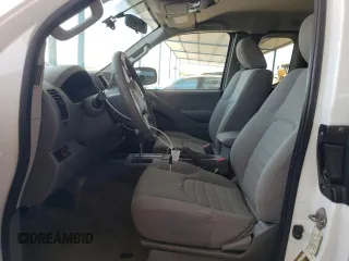 2016 Nissan Frontier S with VIN 1N6BD0CT7GN773349, listed as a Copart auction lot 61022095 with 98,350 mi miles and Salvage title. Bid and sale history available at DreamBid. Image 7.