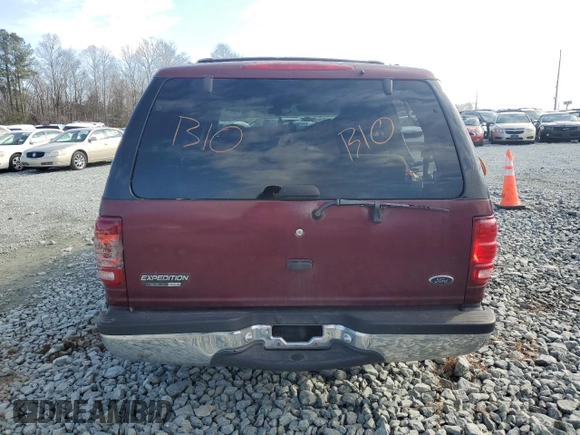 2000 Ford Expedition XLT with VIN 1FMRU166XYLA82466, listed as a Copart auction lot 42507135 with 214,014 mi miles and Salvage Title. Bid and sale history available at DreamBid. Image 6.