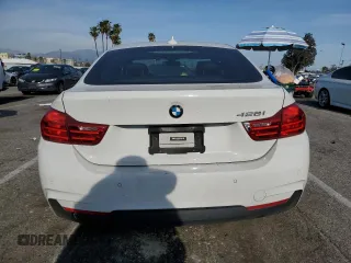 2015 BMW 4 Series 428i with VIN WBA4A9C59FGL87249, listed as a Copart auction lot 52182775 with 57,797 mi miles and Salvage title. Bid and sale history available at DreamBid. Image 6.