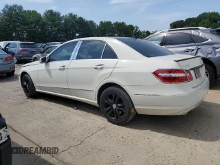 2010 Mercedes-Benz E-Class E 550 Luxury with VIN WDDHF9ABXAA138877, listed as a Copart auction lot 59443674 with 194,875 mi miles and Salvage Title. Bid and sale history available at carsss.com. Image 2.