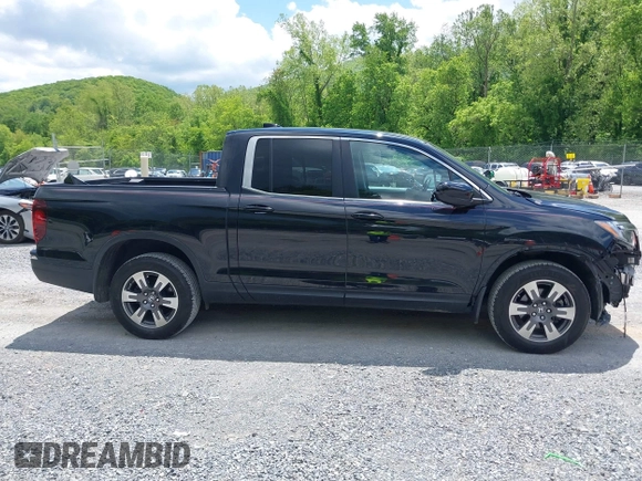 2017 Honda Ridgeline RTL with VIN 5FPYK3F51HB013989, listed as a IAAI auction lot 42206513 with 146,124 mi miles and . Bid and sale history available at DreamBid. Image 13.