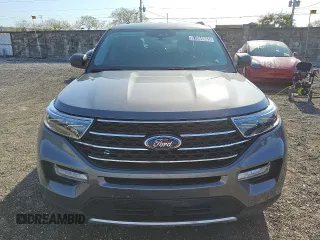 2022 Ford Explorer XLT with VIN 1FMSK8DH7NGA82496, listed as a Copart auction lot 51866865 with 77,014 mi miles and Clean Title. Bid and sale history available at carsss.com. Image 5.