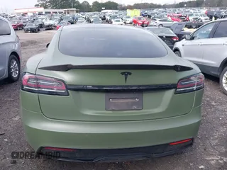 2022 Tesla Model S with VIN 5YJSA1E50NF487306, listed as a IAAI auction lot 41570528 with Not Provided miles and . Bid and sale history available at DreamBid. Image 17.