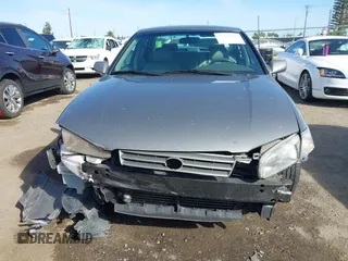 1997 Toyota Camry LE z VIN 4T1BF22K1VU025776, wystawiony jako IAAI lot #42270137 z przebiegiem 168 299 mil mil oraz . Historia ofert i sprzedaży dostępna na DreamBid. Obrazek 13.