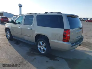 2012 Chevrolet Suburban LT with VIN 1GNSCJE07CR144215, listed as a IAAI auction lot 41924631 with 144,072 mi miles. Bid and sale history available at carsss.com. Image 3.