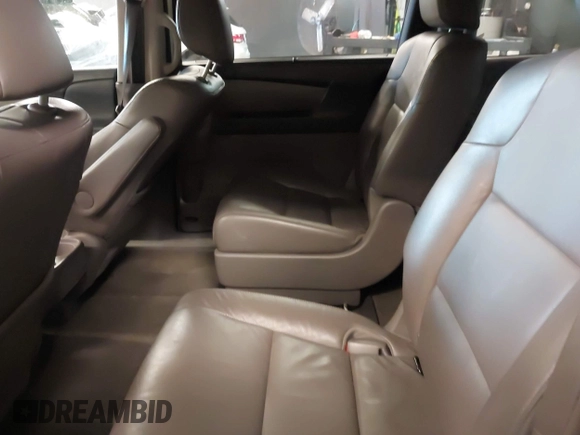 2013 Honda Odyssey EX-L with VIN 5FNRL5H66DB071151, listed as a IAAI auction lot 41914345 with 194,804 mi miles and . Bid and sale history available at carsss.com. Image 8.