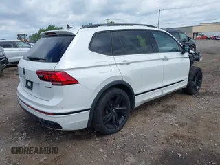2024 Volkswagen Tiguan SE R-Line Black with VIN 3VV8B7AX3RM111526, listed as a IAAI auction lot 42524100 with 7,280 mi miles and . Bid and sale history available at DreamBid. Image 4.