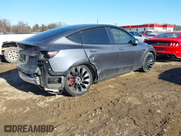 2023 Tesla Model Y Performance with VIN 7SAYGDEF1PF674417, listed as a IAAI auction lot 41421594 with 28,928 mi miles and . Bid and sale history available at DreamBid. Image 4.
