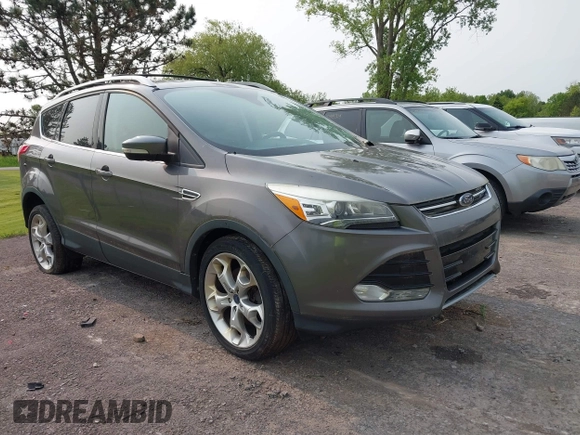 2013 Ford Escape Titanium with VIN 1FMCU9J96DUD74870, listed as a IAAI auction lot 42415332 with 178,651 mi miles and . Bid and sale history available at DreamBid. Image 1.