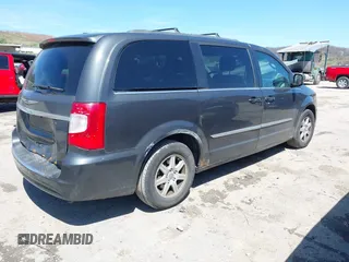 2012 Chrysler Town & Country Touring with VIN 2C4RC1BG9CR313105, listed as a IAAI auction lot 41971919 with 165,986 mi miles. Bid and sale history available at carsss.com. Image 4.