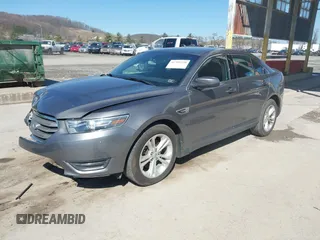 2014 Ford Taurus SEL with VIN 1FAHP2E82EG162676, listed as a IAAI auction lot 41795220 with 125,491 mi miles. Bid and sale history available at carsss.com. Image 2.