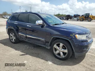 2013 Jeep Grand Cherokee Overland with VIN 1C4RJECT0DC533848, listed as a Copart auction lot 51319385 with 181,436 mi miles and Salvage Title. Bid and sale history available at carsss.com. Image 4.