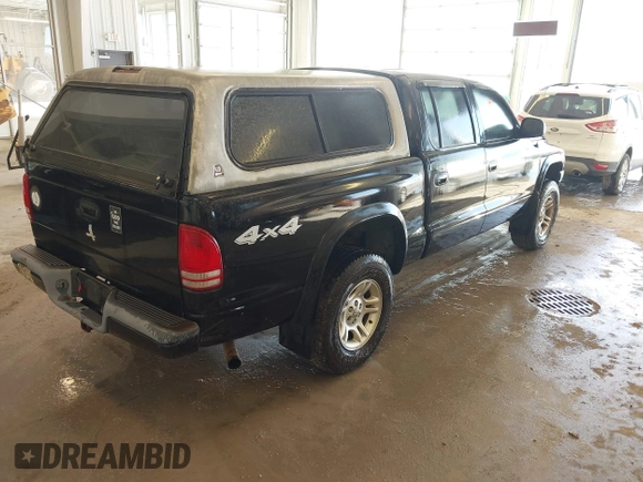 2004 Dodge Dakota Sport with VIN 1D7HG38N24S501391, listed as a IAAI auction lot 41736751 with 213,299 mi miles and . Bid and sale history available at carsss.com. Image 4.