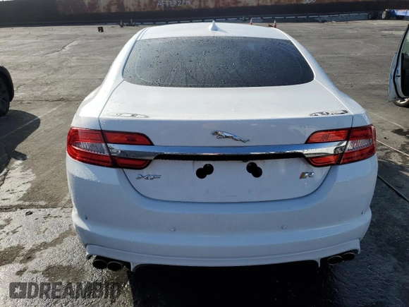 2013 Jaguar XF with VIN SAJWA8JC7DMS77243, listed as a Copart auction lot 77583544 with Not Provided miles and Salvage Title. Bid and sale history available at DreamBid. Image 6.