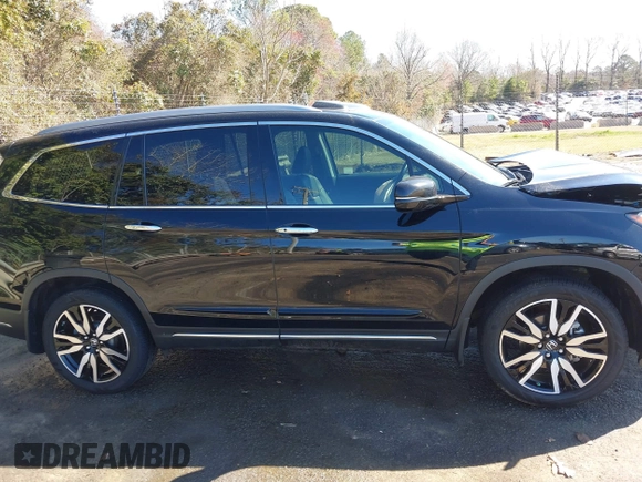 2022 Honda Pilot Touring 7-Passenger with VIN 5FNYF6H65NB030018, listed as a IAAI auction lot 41774147 with 57,391 mi miles. Bid and sale history available at carsss.com. Image 13.