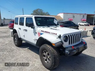 2021 Jeep Wrangler Unlimited Rubicon with VIN 1C4HJXFN9MW519496, listed as a IAAI auction lot 41676845 with 72,767 mi miles. Bid and sale history available at carsss.com. Image 1.