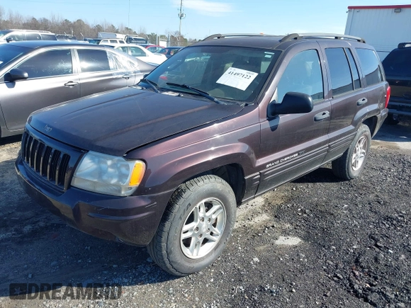 2004 Jeep Grand Cherokee with VIN 1J8GX48S24C266933, listed as a IAAI auction lot 41497122 with 200,899 mi miles and . Bid and sale history available at DreamBid. Image 2.