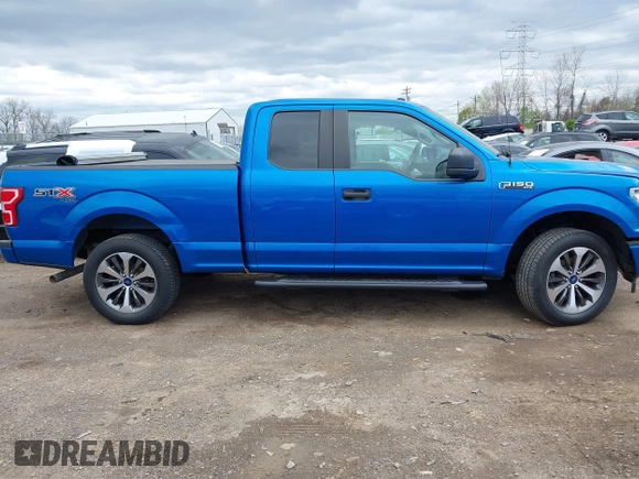 2019 Ford F-150 XL with VIN 1FTEX1EP3KFA11345, listed as a IAAI auction lot 42036915 with 136,608 mi miles. Bid and sale history available at carsss.com. Image 13.