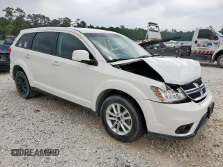 2015 Dodge Journey SXT with VIN 3C4PDCBG0FT546887, listed as a Copart auction lot 57180985 with 119,762 mi miles and Clean title. Bid and sale history available at DreamBid. Image 4.