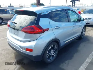2018 Chevrolet Bolt EV Premier with VIN 1G1FX6S08J4113641, listed as a IAAI auction lot 41681041 with 81,390 mi miles. Bid and sale history available at carsss.com. Image 4.
