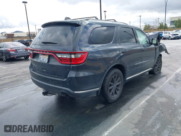 2018 Dodge Durango SXT with VIN 1C4RDJAG8JC112316, listed as a IAAI auction lot 41784762 with Not Provided miles and . Bid and sale history available at DreamBid. Image 4.