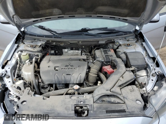 2014 Mitsubishi Lancer SE z VIN JA32V2FW3EU602908, wystawiony jako Copart lot #60148705 z przebiegiem 188 938 mil mil oraz Szkoda całkowita • Salvage title. Historia ofert i sprzedaży dostępna na DreamBid. Obrazek 11.