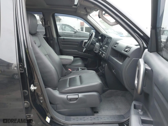 2014 Honda Ridgeline SE with VIN 5FPYK1F66EB007436, listed as a IAAI auction lot 41079137 with 87,359 mi miles. Bid and sale history available at carsss.com. Image 5.