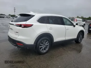 2021 Mazda CX-9 Touring z VIN JM3TCBCY1M0536616, wystawiony jako Copart lot #60242445 z przebiegiem 40 057 mil mil oraz Szkoda całkowita • Salvage title. Historia ofert i sprzedaży dostępna na DreamBid. Obrazek 3.