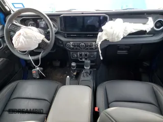 2024 Jeep Gladiator Sport z VIN 1C6HJTAG7RL123052, wystawiony jako Copart lot #79260194 z przebiegiem 2 808 mil mil oraz Szkoda całkowita • Salvage title. Historia ofert i sprzedaży dostępna na DreamBid. Obrazek 8.
