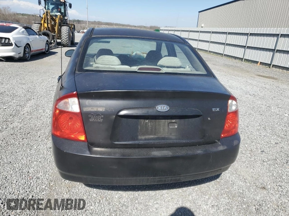 2004 Kia Spectra LX with VIN KNAFE121X45021922, listed as a Copart auction lot 49989845 with 184,189 mi miles and Salvage Title. Bid and sale history available at carsss.com. Image 6.