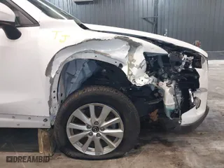2015 Mazda CX-5 Touring with VIN JM3KE4CY4F0509530, listed as a IAAI auction lot 41858134 with 102,360 mi miles. Bid and sale history available at carsss.com. Image 19.