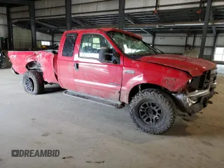2001 Ford Super Duty F-250 XL with VIN 1FTNX21F31ED77538, listed as a Copart auction lot 50461984 with 153,571 mi miles and Salvage Title. Bid and sale history available at carsss.com. Image 4.