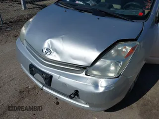 2005 Toyota Prius with VIN JTDKB20UX57054812, listed as a IAAI auction lot 42145700 with 171,163 mi miles. Bid and sale history available at carsss.com. Image 6.