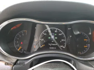 2014 Jeep Grand Cherokee Limited z VIN 1C4RJFBGXEC101022, wystawiony jako Copart lot #57526125 z przebiegiem 124 463 mil mil oraz Szkoda całkowita • Salvage title. Historia ofert i sprzedaży dostępna na DreamBid. Obrazek 9.