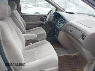 2000 Toyota Sienna LE with VIN 4T3ZF13C5YU315823, listed as a IAAI auction lot 42232438 with 248,010 mi miles and . Bid and sale history available at DreamBid. Image 5.