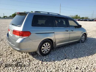 2009 Honda Odyssey EX-L with VIN 5FNRL38799B034292, listed as a Copart auction lot 52547205 with 116,658 mi miles and Salvage Title. Bid and sale history available at DreamBid. Image 3.