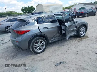 2018 Infiniti QX30 Premium z VIN SJKCH5CPXJA003377, wystawiony jako IAAI lot #41876556 z przebiegiem 91 673 mil mil oraz . Historia ofert i sprzedaży dostępna na DreamBid. Obrazek 4.