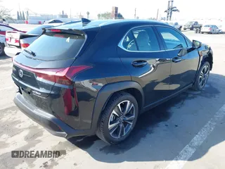2024 Lexus UX with VIN JTHX6JBH7R2162231, listed as a IAAI auction lot 41665179 with 21,913 mi miles. Bid and sale history available at carsss.com. Image 4.