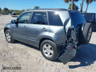 2006 Suzuki Grand Vitara Premium with VIN JS3TD943064100693, listed as a IAAI auction lot 41772479 with 135,901 mi miles. Bid and sale history available at carsss.com. Image 3.