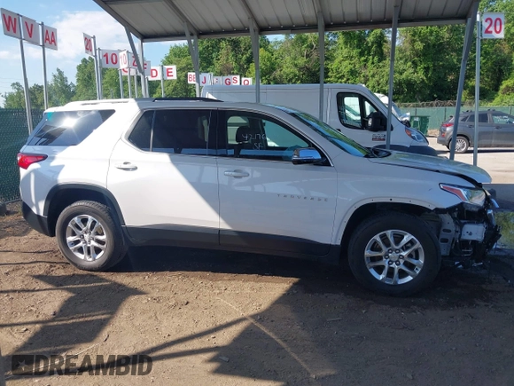2018 Chevrolet Traverse LT Cloth z VIN 1GNEVGKWXJJ270664, wystawiony jako IAAI lot #42176492 z przebiegiem 73 534 mil mil oraz . Historia ofert i sprzedaży dostępna na DreamBid. Obrazek 14.