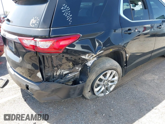 2020 Chevrolet Traverse LS z VIN 1GNERFKW0LJ172972, wystawiony jako IAAI lot #42011302 z przebiegiem 90 799 mil mil oraz . Historia ofert i sprzedaży dostępna na DreamBid. Obrazek 6.
