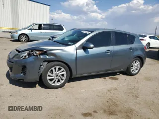 2012 Mazda 3 i Touring with VIN JM1BL1L7XC1534992, listed as a Copart auction lot 63142035 with 122,952 mi miles and Salvage title. Bid and sale history available at DreamBid. Image 1.