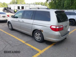 2005 Honda Odyssey EX-L with VIN 5FNRL38715B003399, listed as a IAAI auction lot 42589092 with 252,737 mi miles and . Bid and sale history available at DreamBid. Image 3.