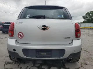 2012 MINI Countryman with VIN WMWZB3C5XCWM06778, listed as a Copart auction lot 61201285 with 64,676 mi miles and Salvage title. Bid and sale history available at DreamBid. Image 6.