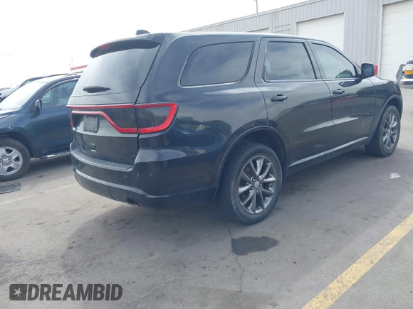 2015 Dodge Durango SXT with VIN 1C4RDJAGXFC796034, listed as a IAAI auction lot 42057983 with 159,108 mi miles and . Bid and sale history available at DreamBid. Image 4.